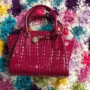 A maroon purse